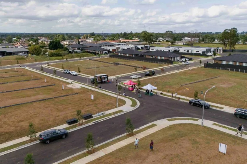 Maxi taxi Claremont Meadows service near new residential development area offering reliable local and airport transfers across Sydney.